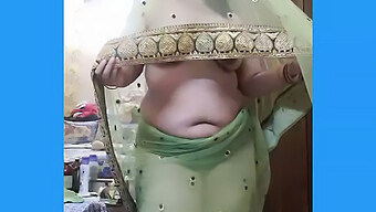 Mature Indian Milf Teases Her Young Lover In A Net Saree